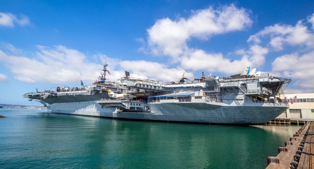 Visitors touring the flight deck of the USS Midway Museum