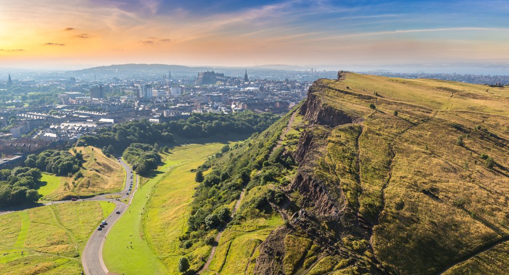 Arthur’s Seat with golden sunset above Edinburgh