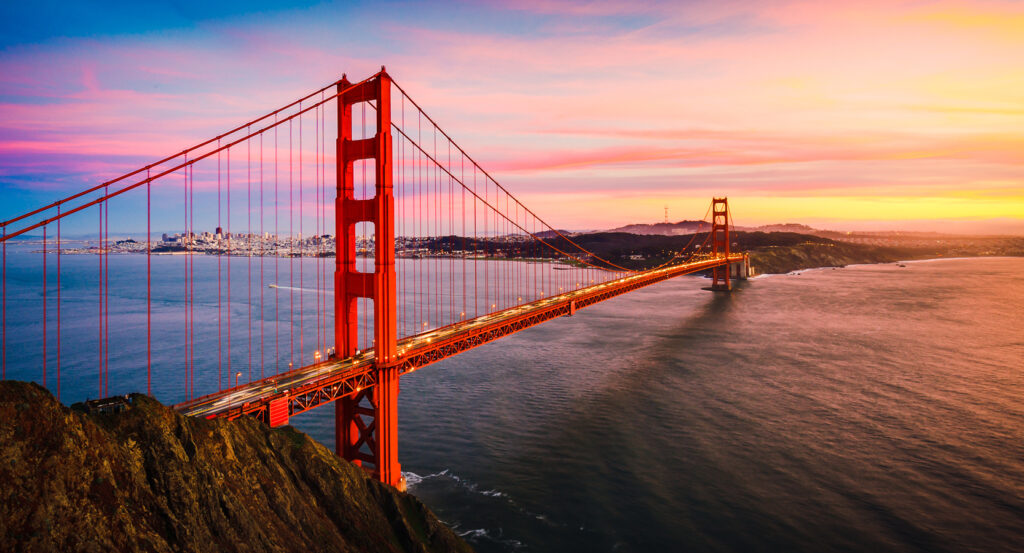 Iconic view of the Golden Gate Bridge spanning the bay at dusk