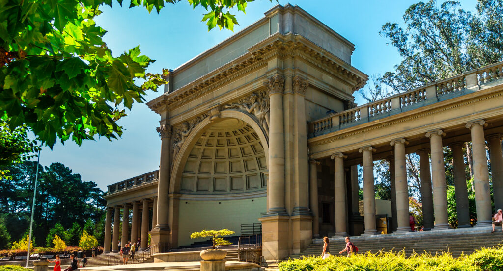 Scenic view of Golden Gate Park's classical architecture surrounded by greenery