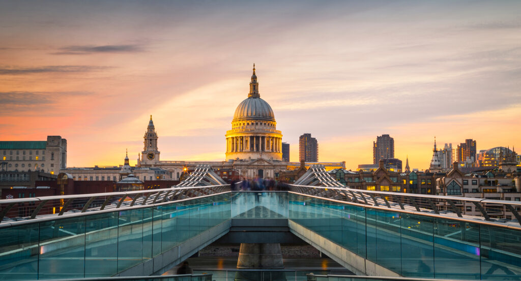 Iconic dome of St Paul’s Cathedral glowing against London skyline