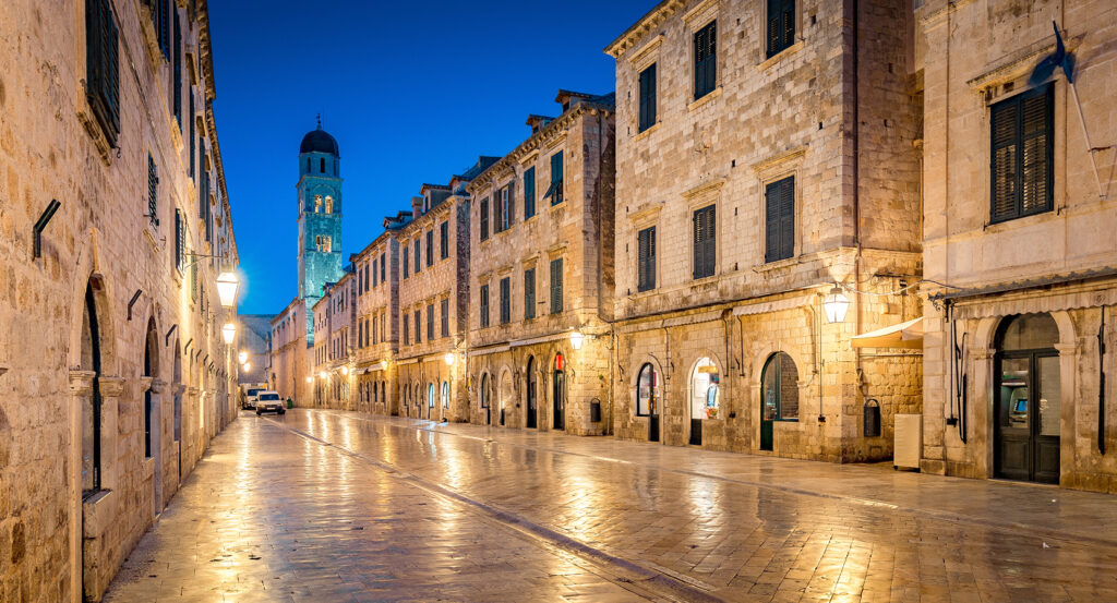 Historic stone buildings lining Dubrovnik Old Town streets