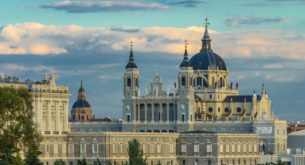 Panoramic view of Almudena Cathedral beside the Royal Palace