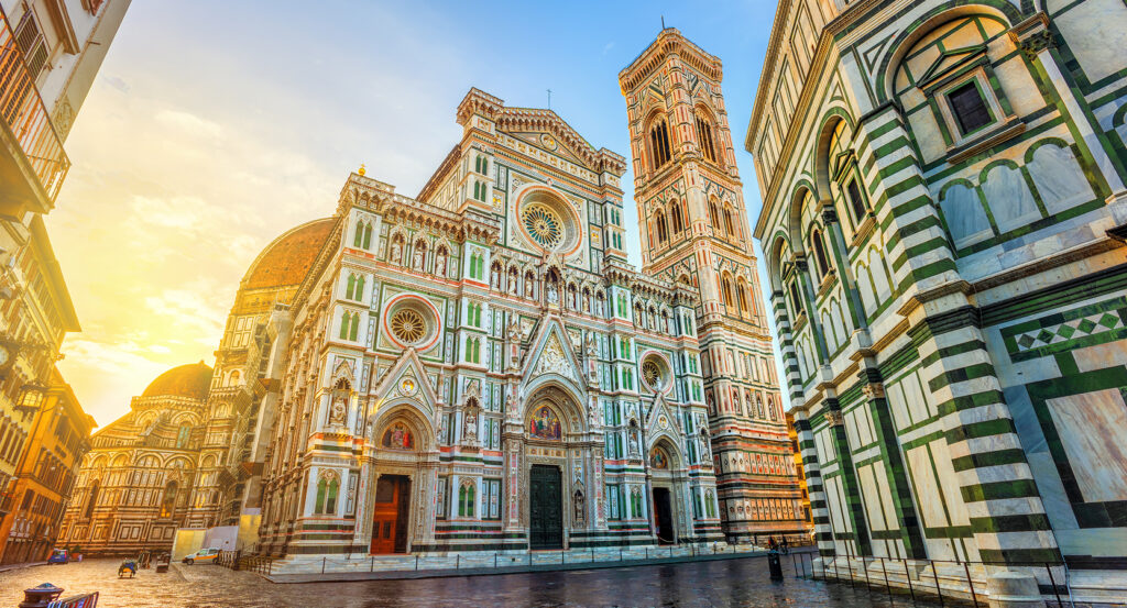 Giotto's Bell Tower with marble façade and city backdrop