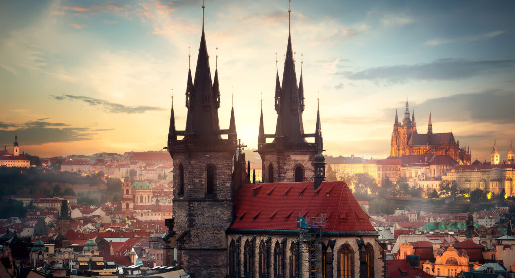 Panoramic view of Old Town Square with historic buildings and spires