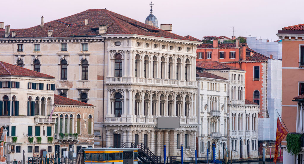 View of Ca' Rezzonico in Venice with historic façade facing the canal