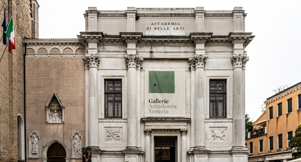 Gallerie dell'Accademia museum entrance in Venice with people walking