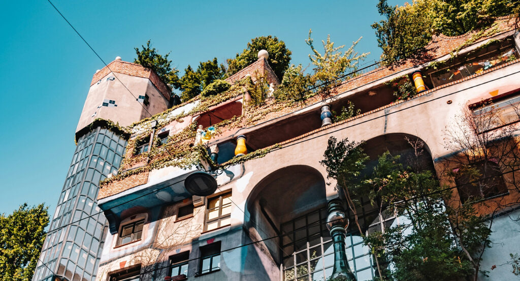 Vienna's Hundertwasserhaus featuring vibrant façade and rooftop gardens.