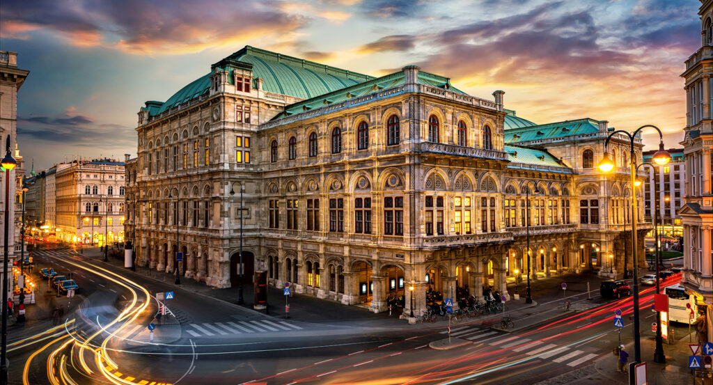 Historic Vienna State Opera house illuminated in evening