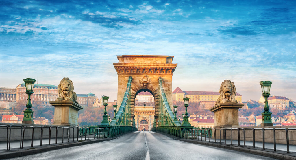 Historic Chain Bridge in Budapest at sunrise with Buda Castle view