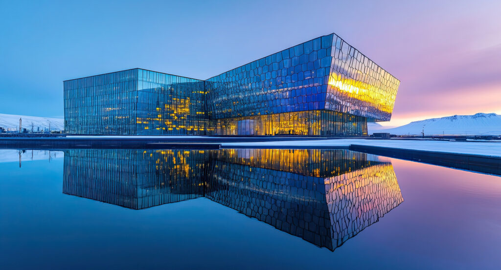 Modern glass facade of Harpa Concert Hall in Reykjavik Iceland with colorful light