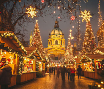 St Stephen’s Basilica glowing over Budapest Christmas market