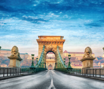Széchenyi Chain Bridge in Budapest with lion statues and archway