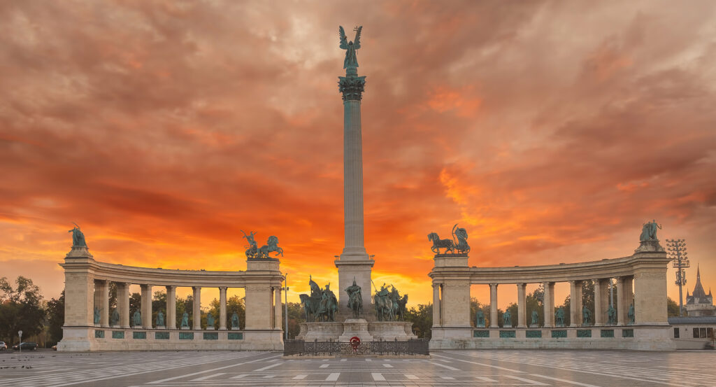 Wide view of Heroes’ Square Budapest with Archangel Gabriel statue