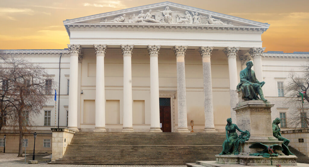 Neoclassical facade of the Hungarian National Museum in Budapest with historic monument