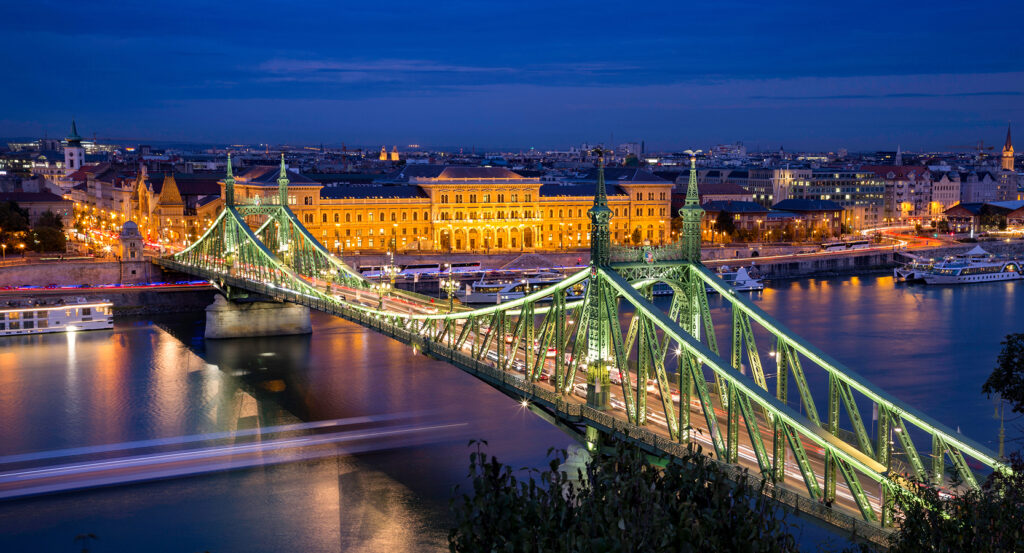 Illuminated Liberty Bridge spanning the Danube in Budapest at night