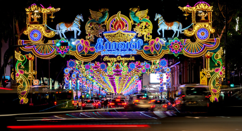 Vibrant night view of Little India Singapore with festive decorations and traffic