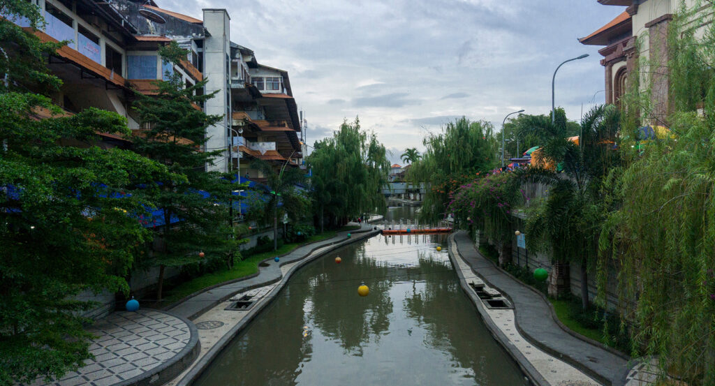Evening lights reflecting on the water at Kumbasari Park Denpasar