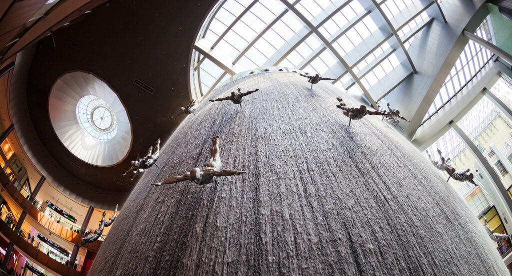 Shoppers exploring The Dubai Mall's luxury interiors