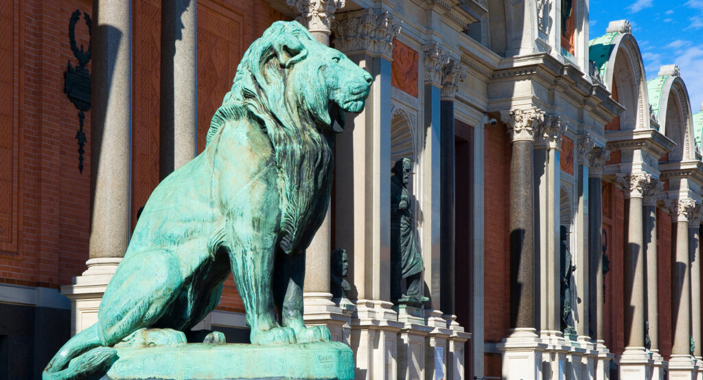 Exterior of the Carlsberg Glyptotek art museum with statues and columns