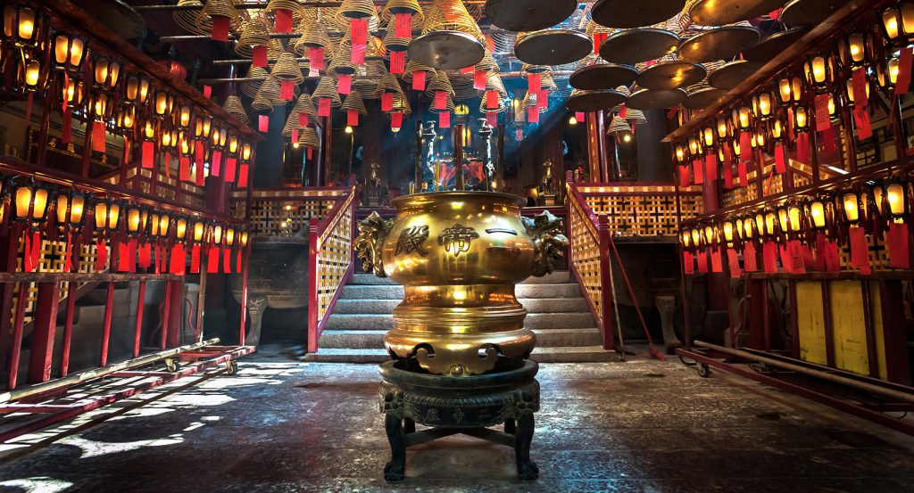 Man Mo Temple in Hong Kong with incense coils hanging from the ceiling