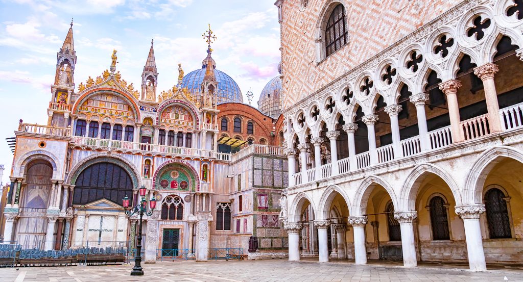 Venetian gothic architecture glowing in the quiet morning light of Piazza San Marco