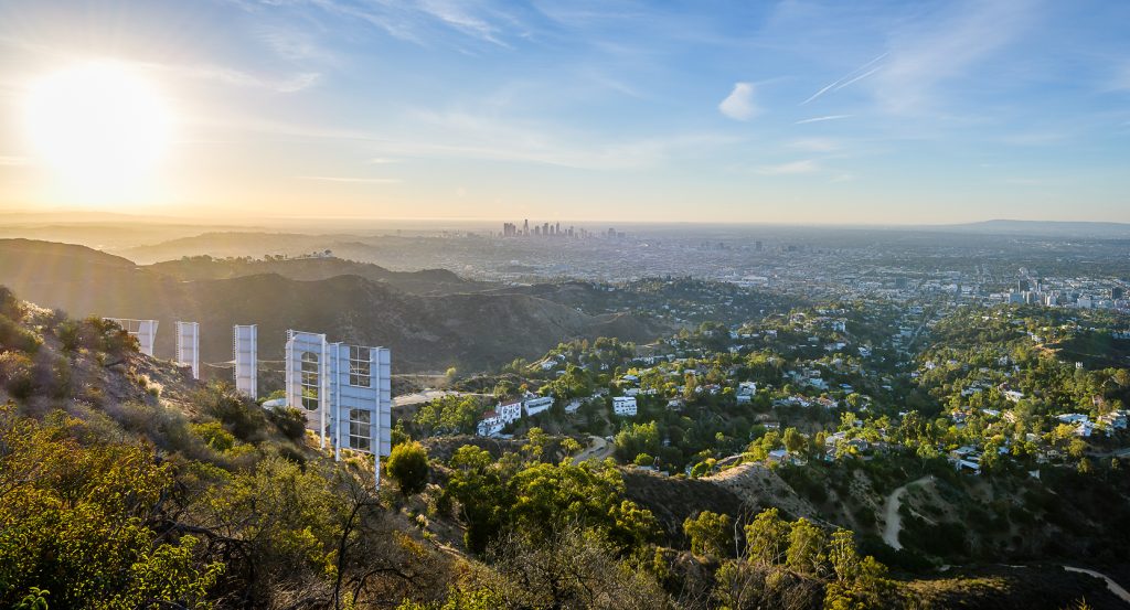 View from the Hollywood Hills overlooking downtown Los Angeles at golden hour.