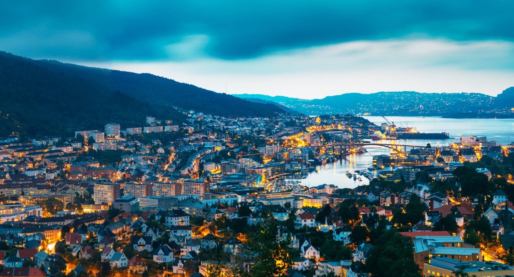 Bergen’s coastal skyline illuminated under twilight skies