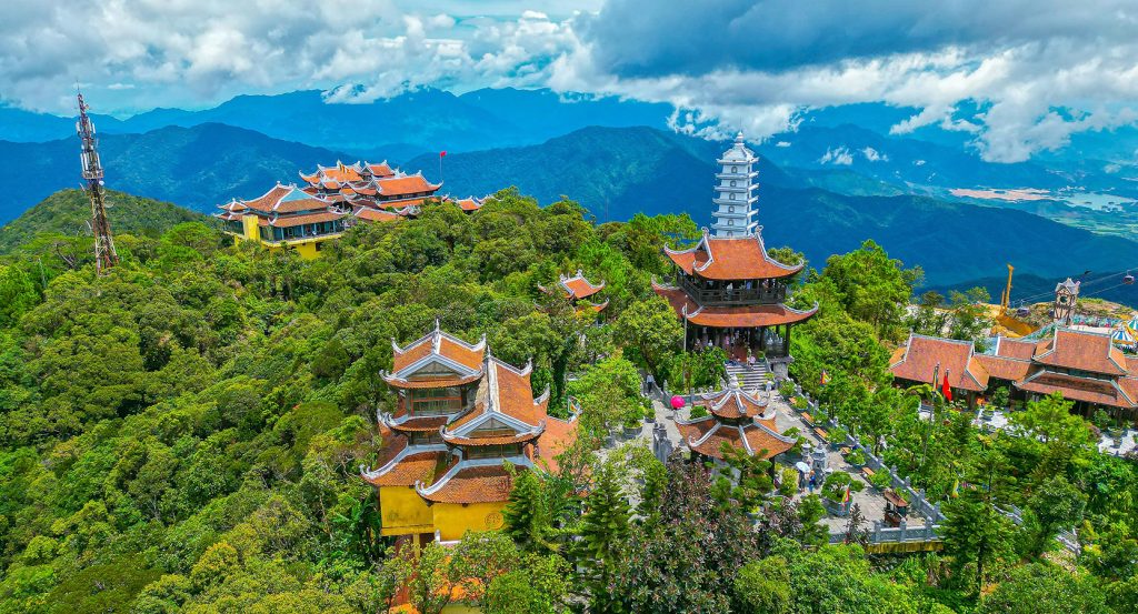 Traditional Vietnamese temples on a mountaintop overlooking Da Nang’s valleys