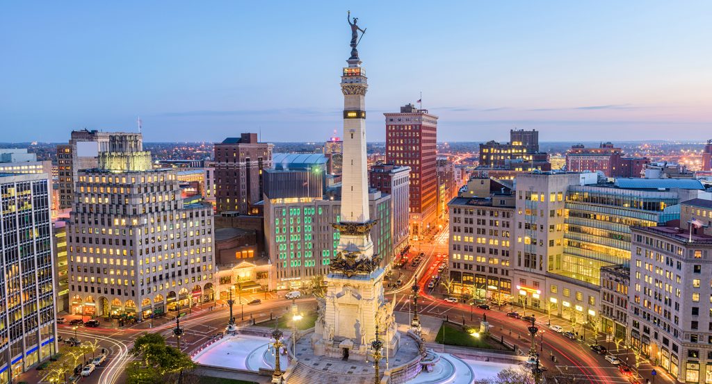 Evening lights glow around the historic Soldiers & Sailors Monument in the heart of Indianapolis’ skyline.