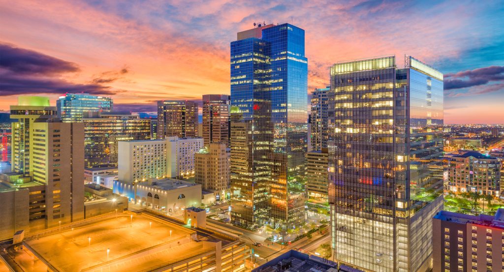 Colorful desert sunset over Phoenix high-rises and modern urban landscape
