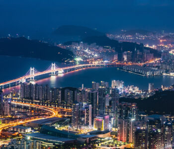 Busan skyline and Gwangan Bridge glowing at night
