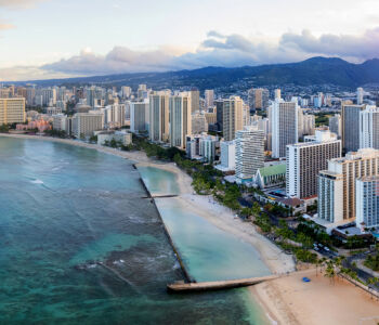 Honolulu skyline overlooking Waikiki Beach and the turquoise waters of the Pacific Ocean