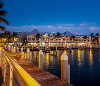 Coastal boutique hotel in Key West with pastel decor and palm trees