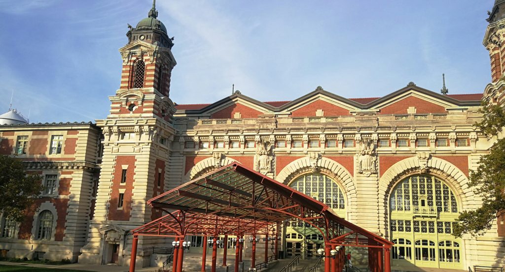 Ellis Island National Museum of Immigration entrance on a sunny day