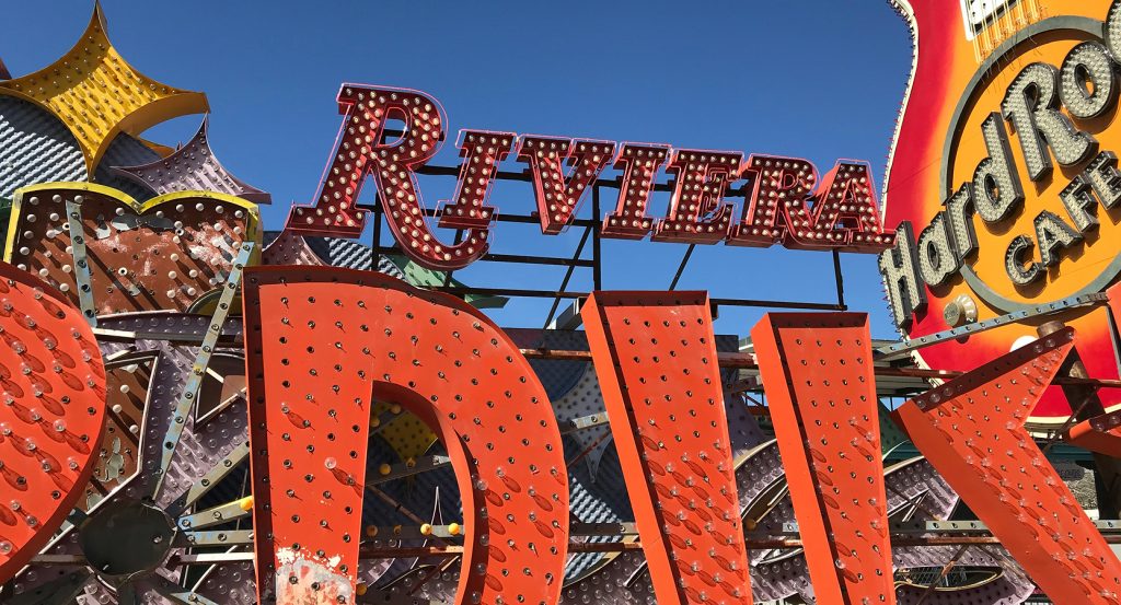 Illuminated neon signs glowing at the Neon Museum at night
