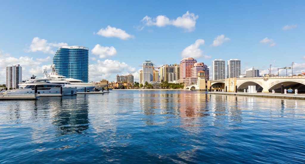 Waterfront view of West Palm Beach Marina with yachts and Royal Park Bridge