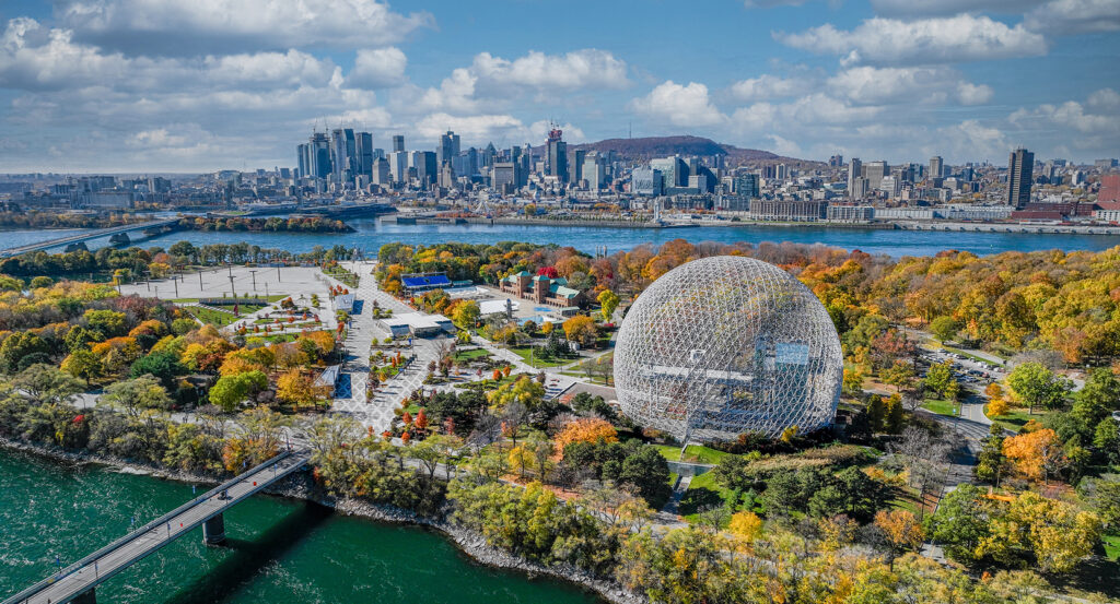 Montreal Biosphere dome surrounded by fall colors at Parc Jean-Drapeau.