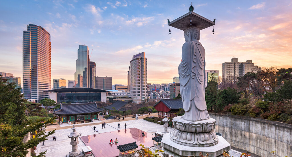 Bongeunsa Temple grounds with modern skyscrapers in the background