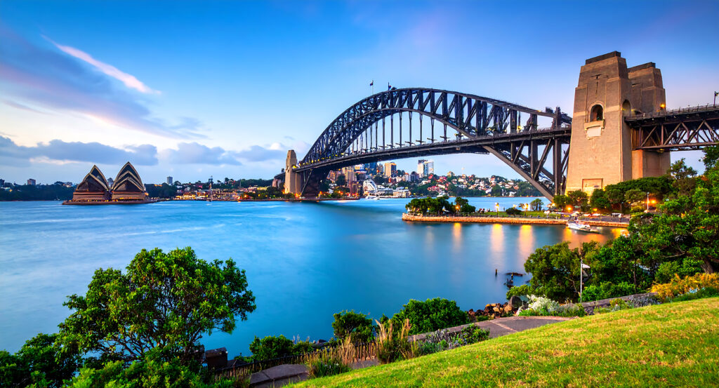 Panoramic view of Sydney Harbour Bridge over the water