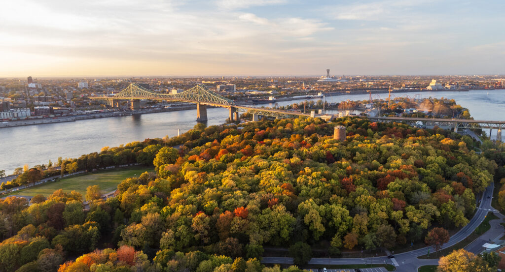 Montreal skyline behind Parc Jean-Drapeau during autumn