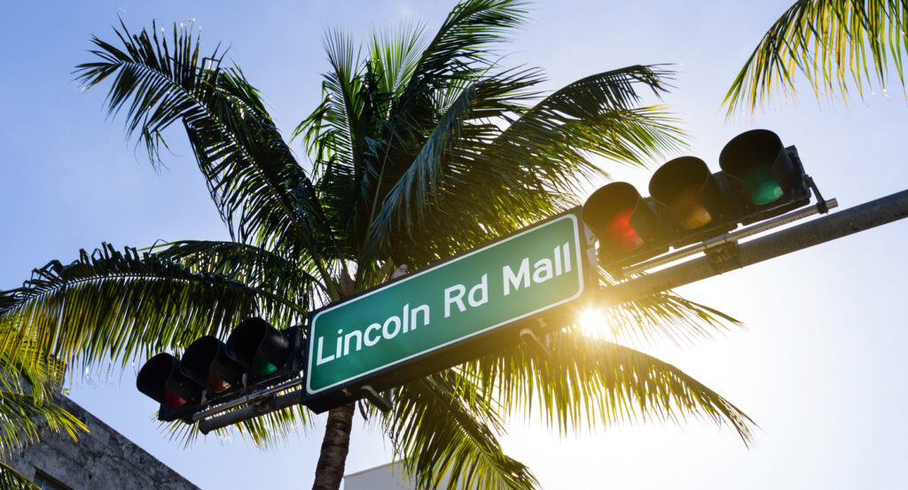 Pedestrian shopping street at Lincoln Road Mall with cafes and boutiques in Miami Beach