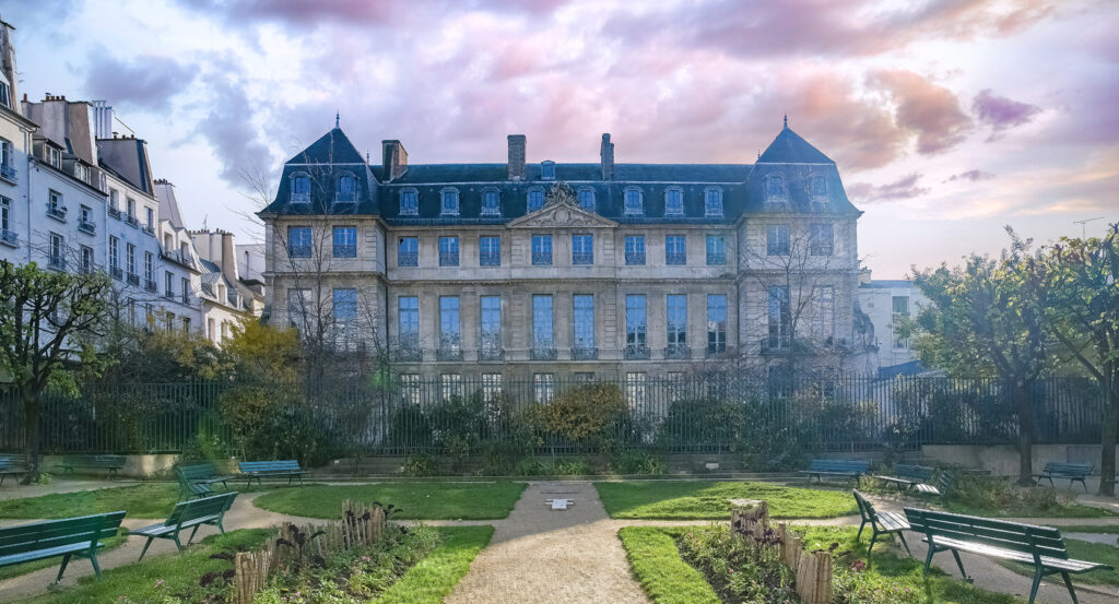 Garden benches and pathway leading to Musee Picasso in Paris