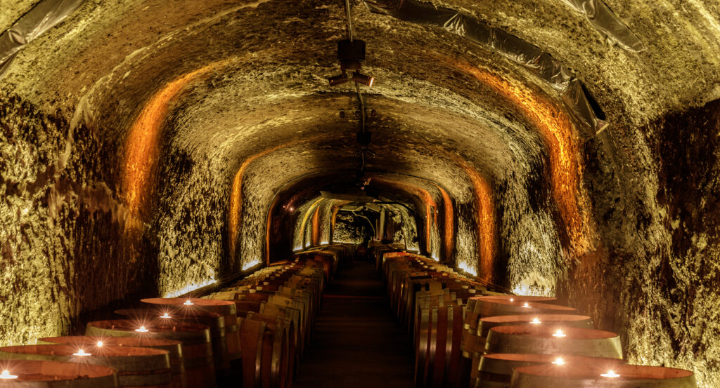 Interior of Del Dotto Historic Winery Caves with volcanic stone walls