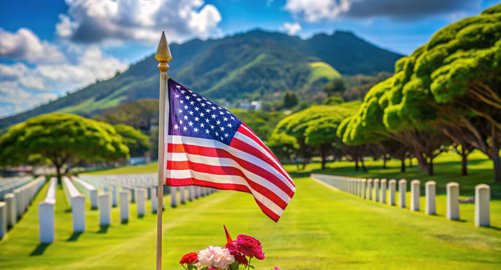 Punchbowl National Memorial Cemetery with rows of graves and mountain backdrop