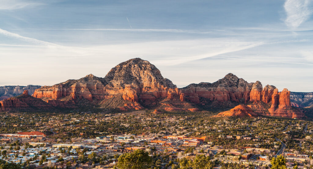 Aerial perspective of Sedona with Airport Mesa and red rock backdrop