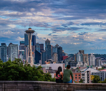 Seattle skyline and Space Needle viewed from Kerry Park with Mount Rainier rising behind the city.
