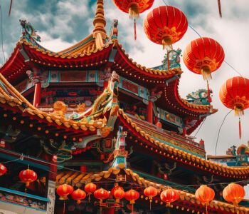 Lantern-decorated Thean Hou Temple roofline with vibrant red and gold details.